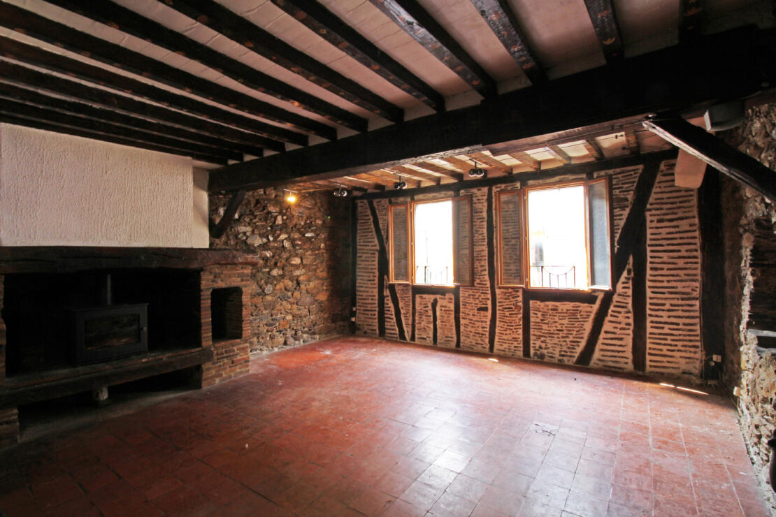 Spacious village property to be renovated with roof terrace on a charming street, near popular town of Revel