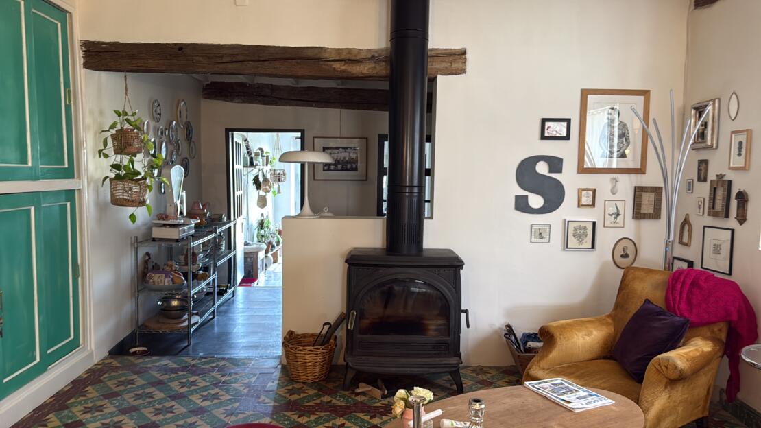 Quirky town house with 2 bedrooms, lounge, garden and room on first floor with patio doors for development.